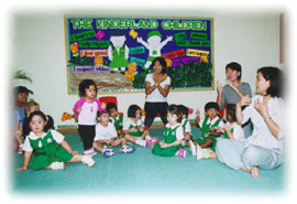 Group singing activities bring the children together for fun
